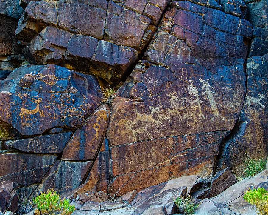 Rock art from the Coso Range, preserving petroglyphs in a rugged desert landscape.